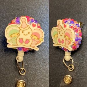 Twin star badge reel